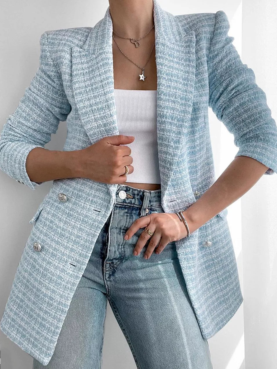 Greta kjørte en tweed-blazer